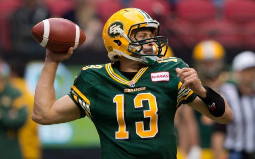 Image football player in green and yellow jersey shirt