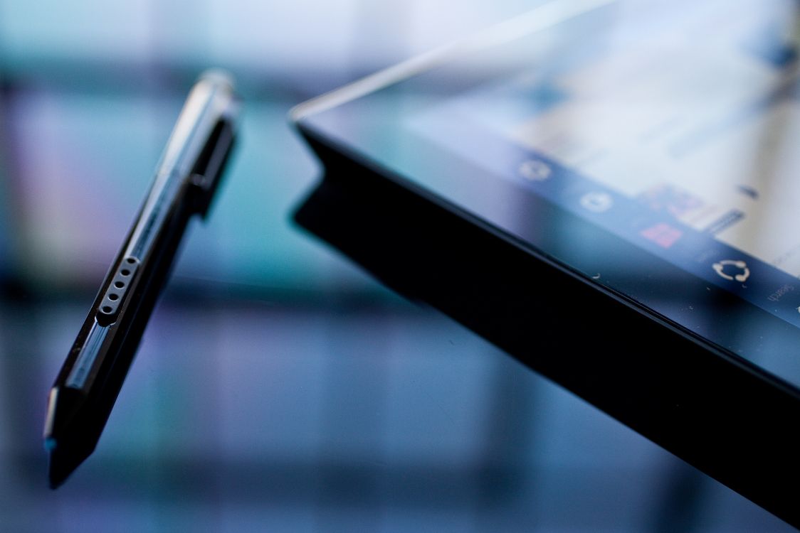 black ipad on white table