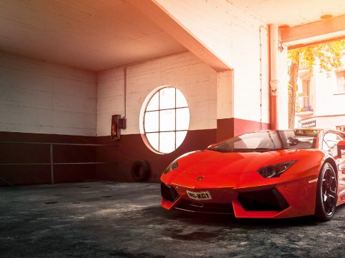 Image red ferrari sports car parked in garage