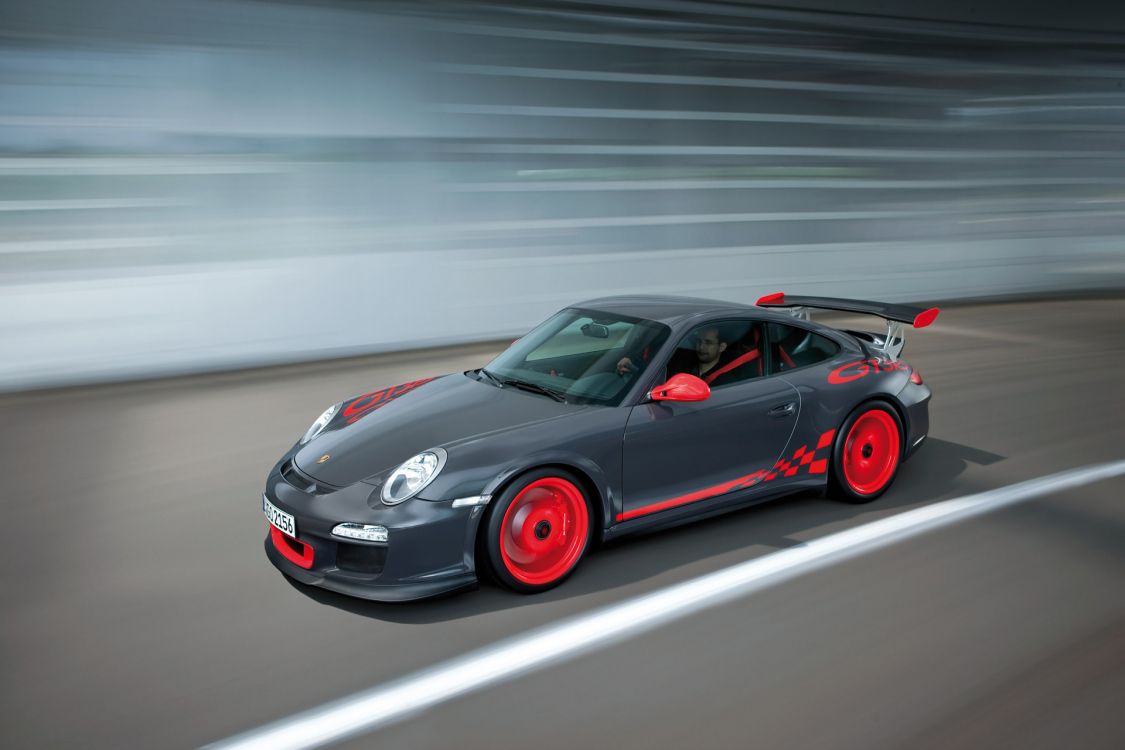 red porsche 911 on road