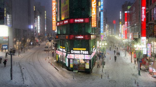 Image people walking on street during nighttime