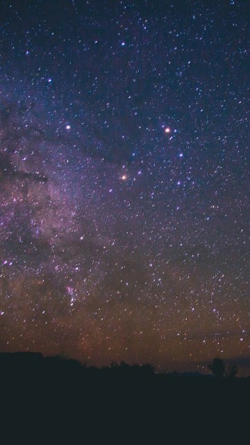 Image silhouette of mountain under starry night