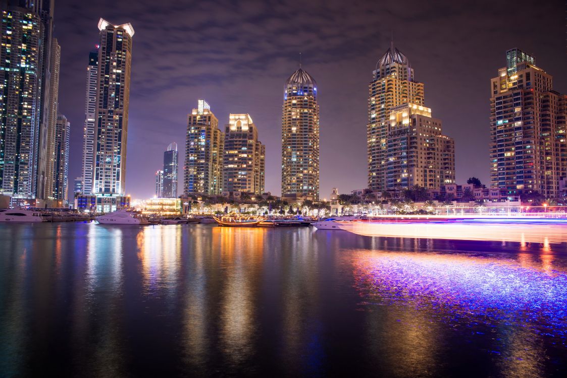 city skyline during night time