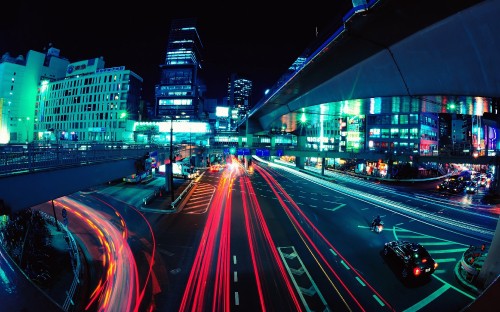 Image time lapse photography of cars on road during night time