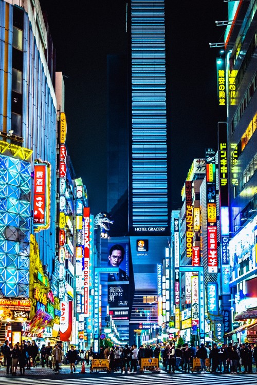 Image man in black jacket standing on street during nighttime