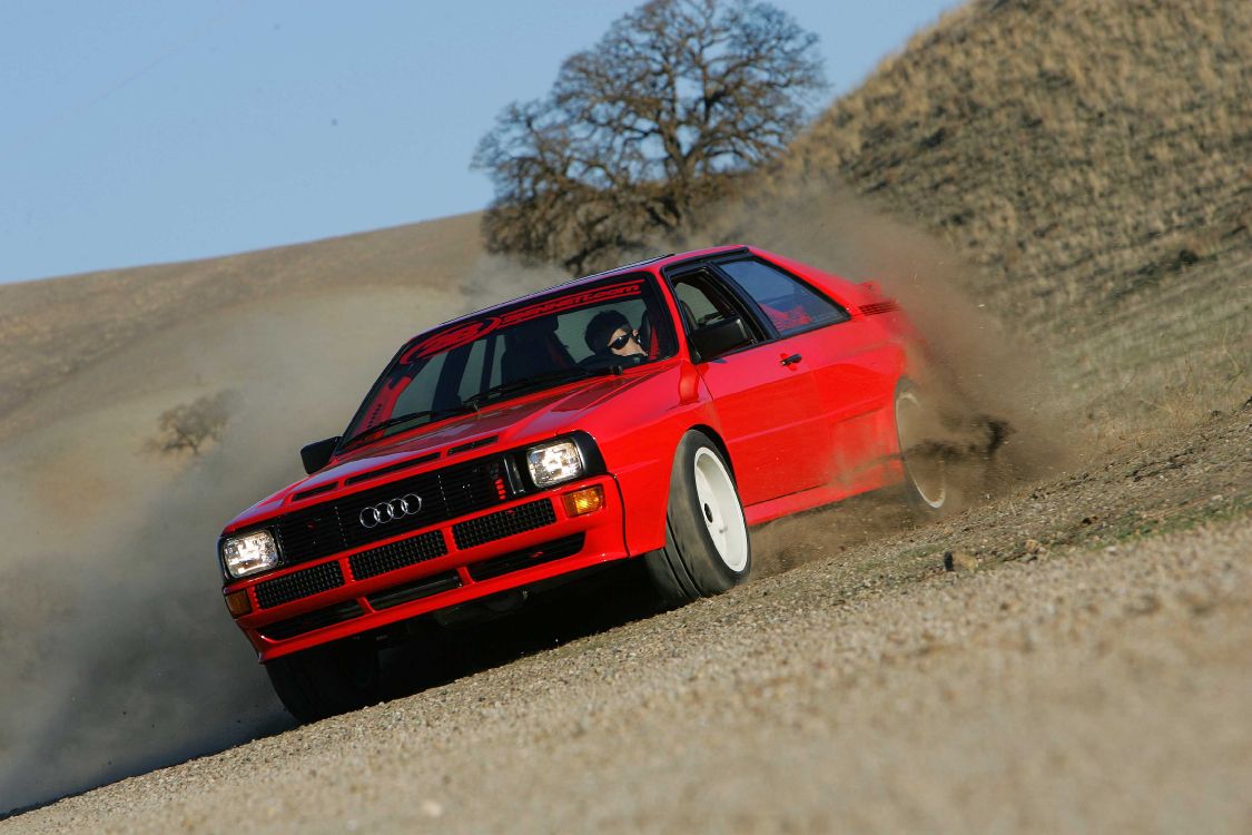 red audi a 4 on road during daytime