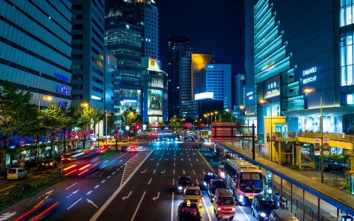 Image cars on road in city during night time