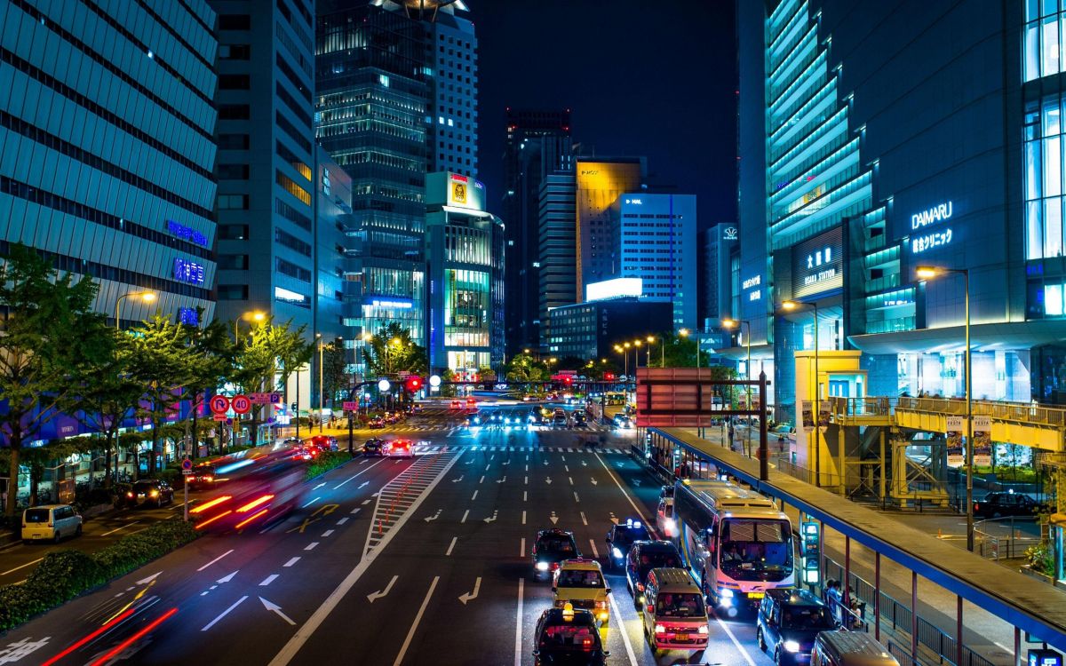 cars on road in city during night time