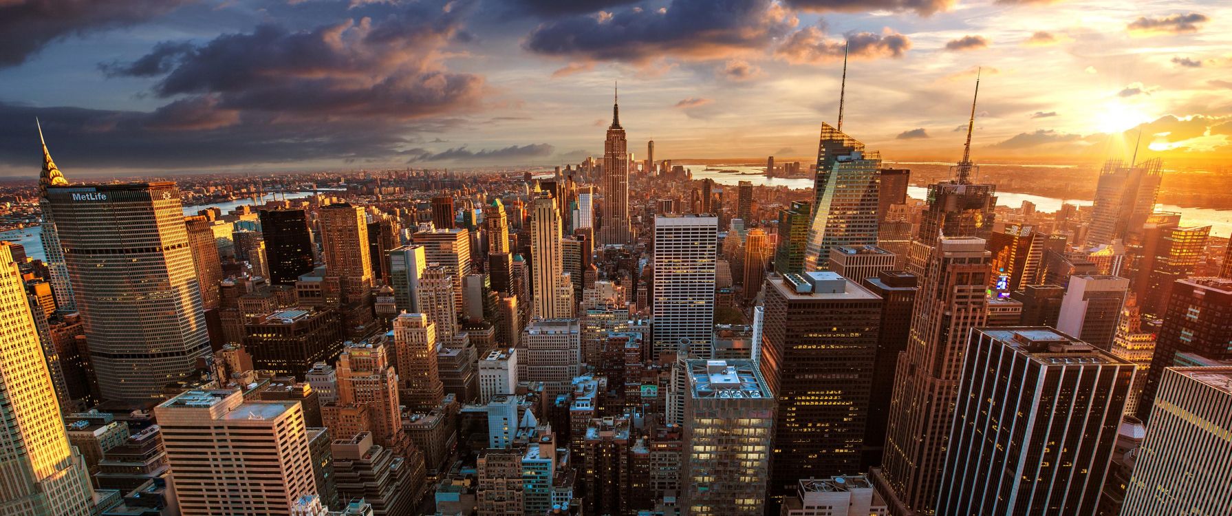 aerial view of city buildings during sunset