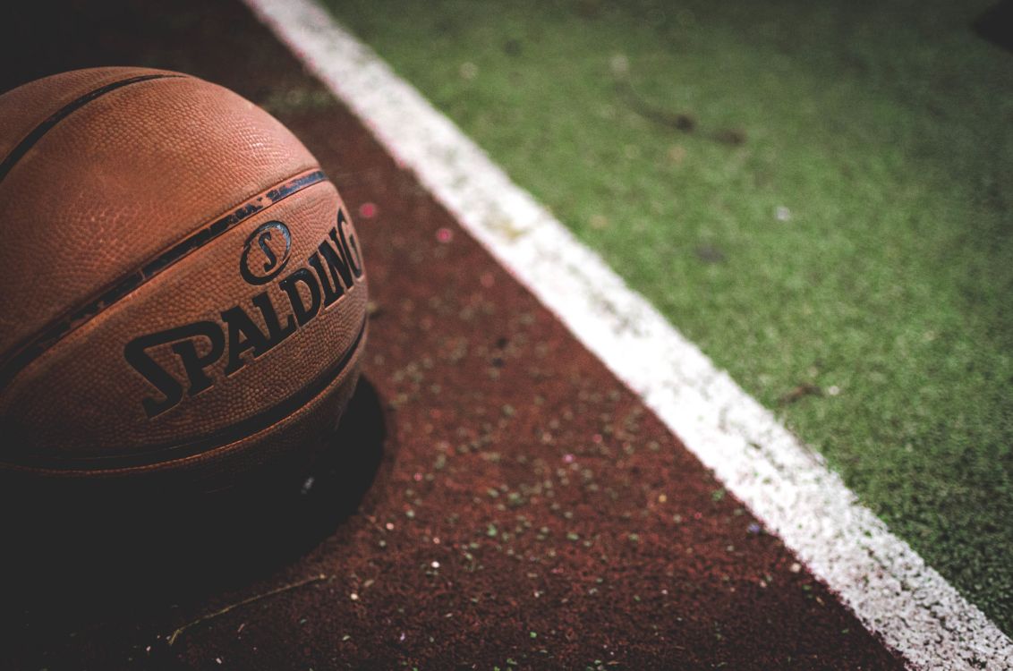 Brown and Black Basketball on Brown and White Concrete Floor. Wallpaper in 4928x3264 Resolution