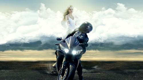 Image woman in black leather jacket riding black motorcycle