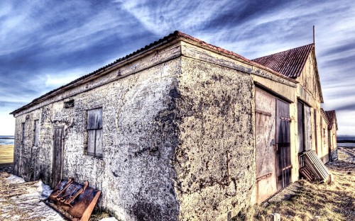 Image brown concrete building under blue sky during daytime