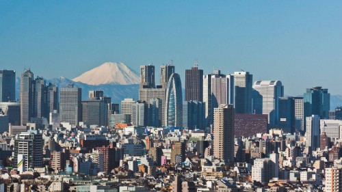 Image city skyline under blue sky during daytime