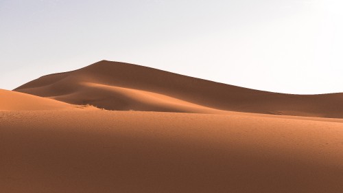 Image desert under blue sky during daytime