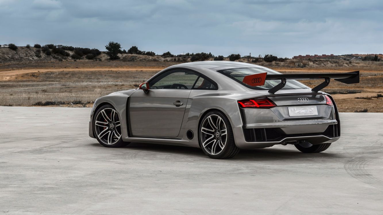 silver porsche 911 on white sand during daytime