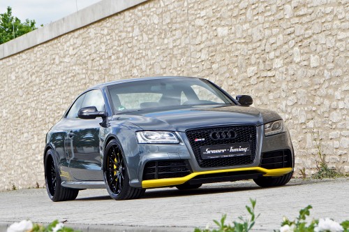 Image black audi r 8 parked beside brown brick wall