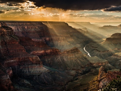 Image brown rocky mountain under cloudy sky during daytime