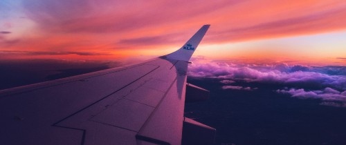 Image white and gray airplane wing