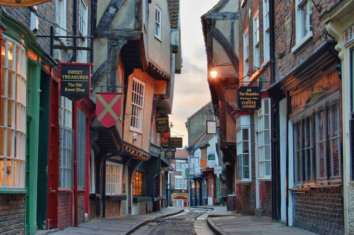 Wallpaper Empty Street Between Buildings During Daytime Background Download Free Image