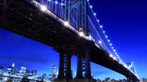 Image blue bridge under blue sky during night time