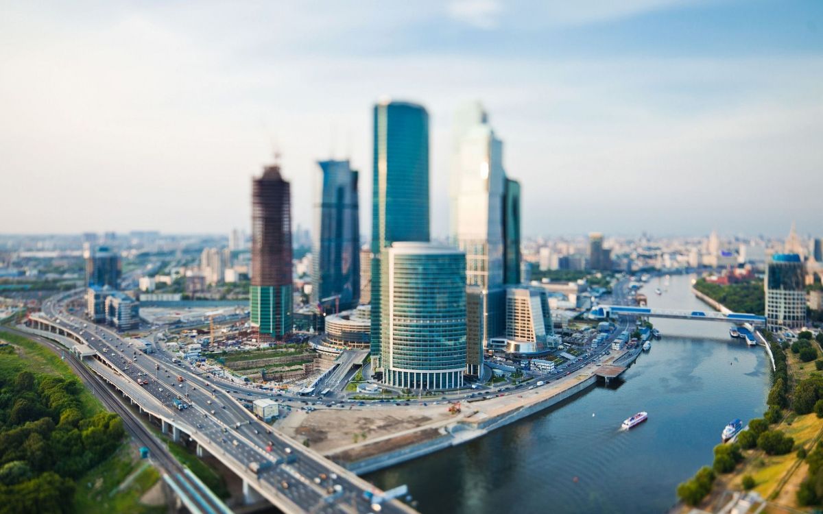 high rise buildings near body of water during daytime