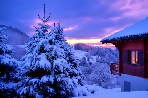 Image brown wooden house on snow covered ground