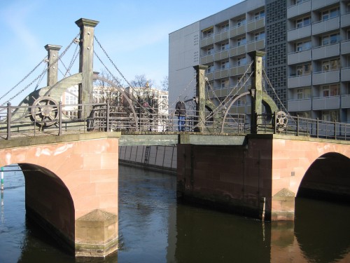 Image white bridge over river during daytime