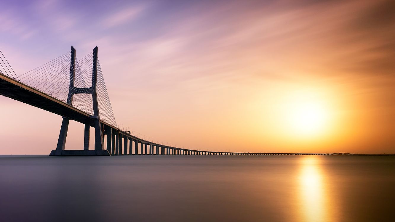 Vasco da Gama Bridge, water, cloud, body of water, dusk