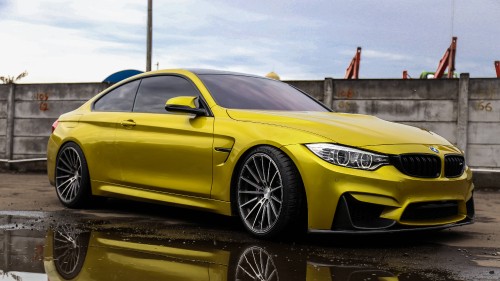 Image yellow mercedes benz coupe on road during daytime