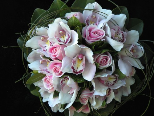 Image pink and white flowers on black textile