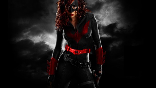 Image woman in black leather jacket wearing red goggles