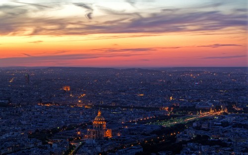 Image aerial view of city during sunset