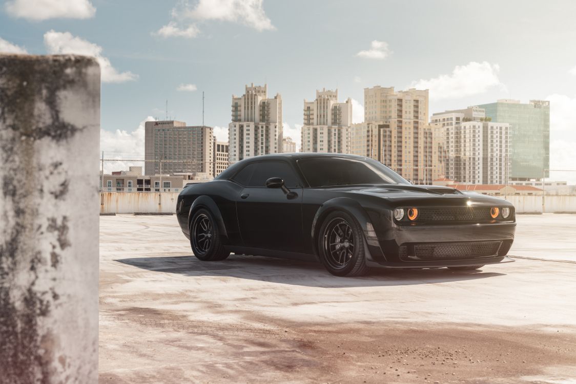 Black Coupe Parked on Gray Concrete Pavement During Daytime. Wallpaper in 7838x5229 Resolution