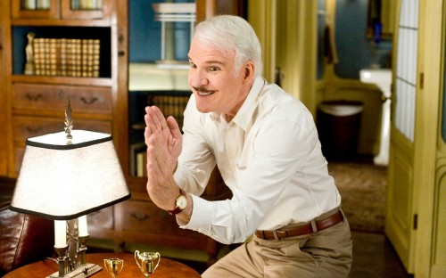 Image man in white dress shirt and brown pants sitting on chair