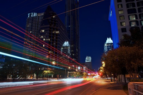 Image time lapse photography of cars on road during night time