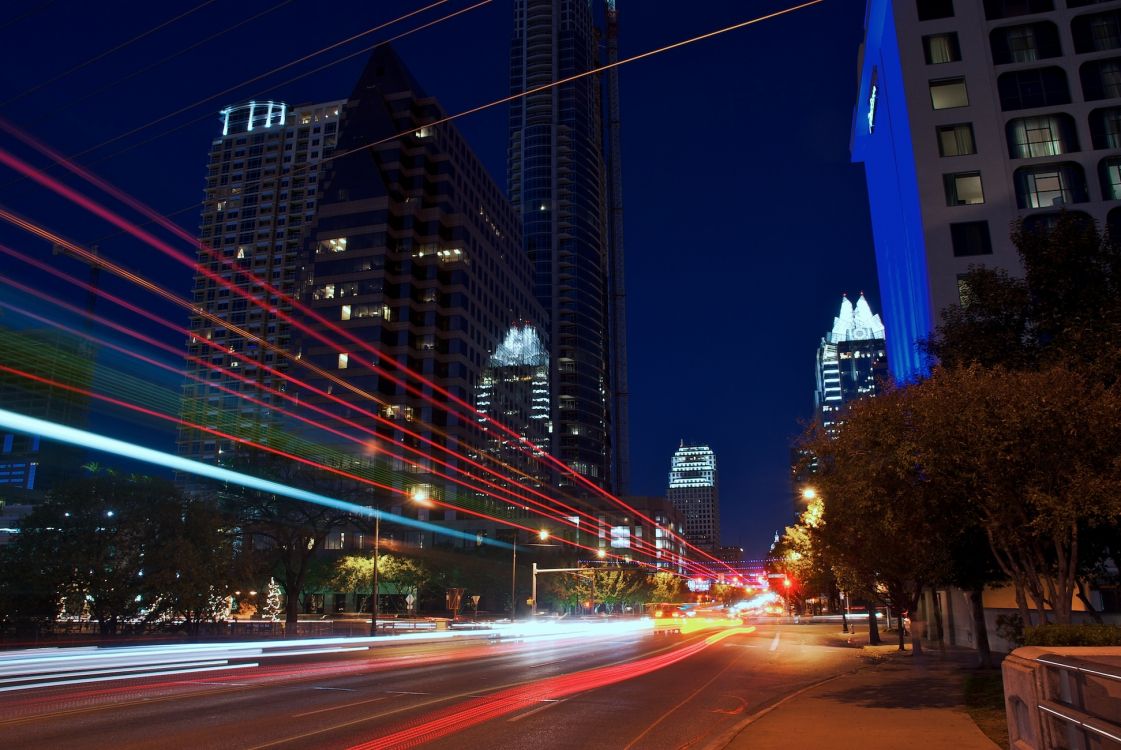 time lapse photography of cars on road during night time