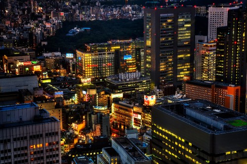 Image aerial view of city buildings during night time