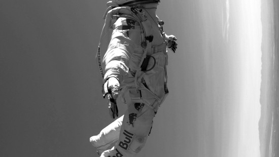 Image grayscale photo of man in camouflage suit and helmet
