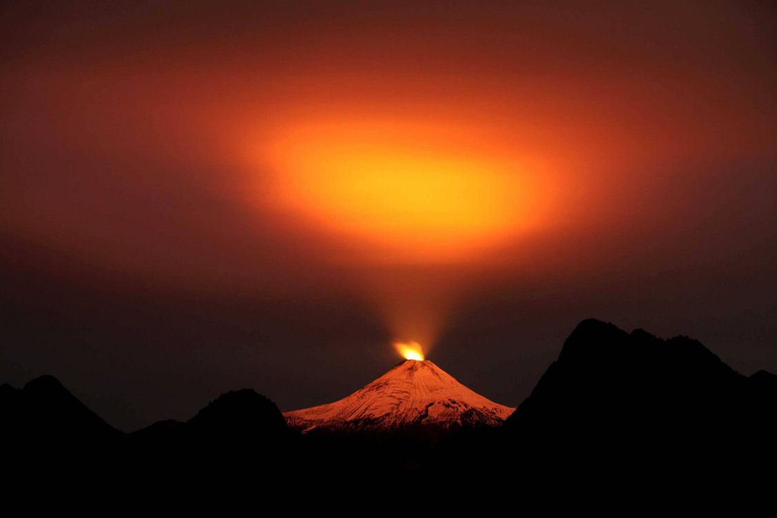 silhouette of mountain during sunset