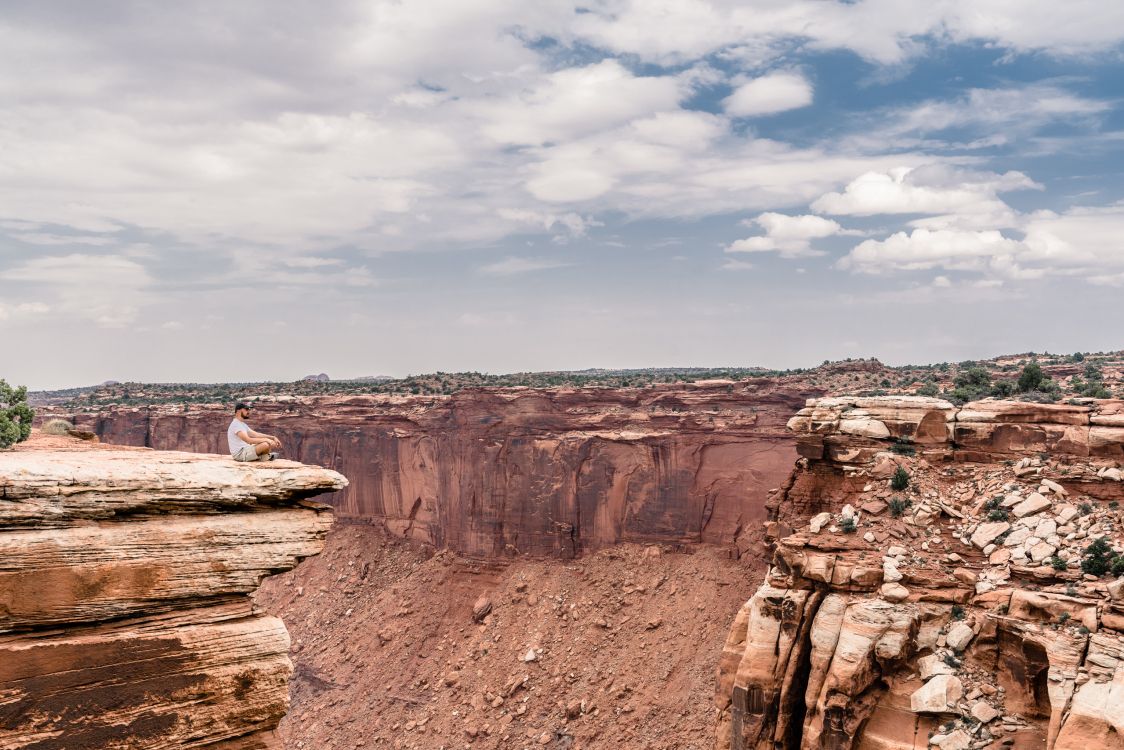 brown rock formation under blue sky during daytime