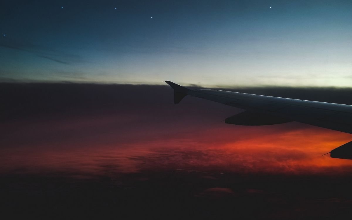 Airplane Wing Over The Clouds During Sunset. Wallpaper in 2560x1600 Resolution