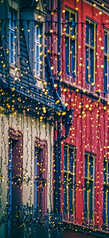 Image red and blue concrete building during daytime