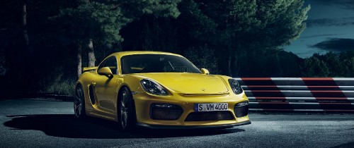 Image yellow porsche 911 parked on road during daytime