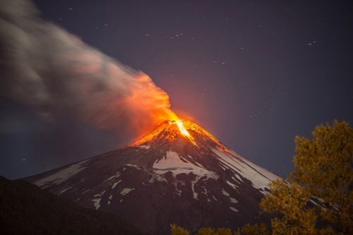 Image snow covered mountain under starry night