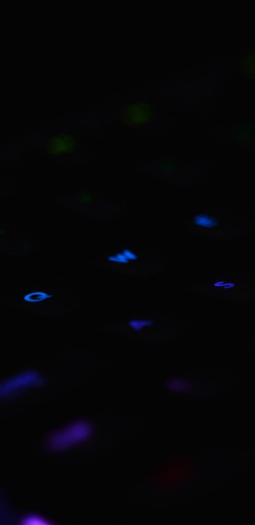 Image purple and pink lighted computer keyboard