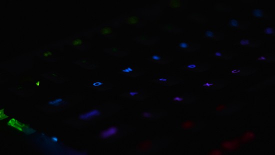 Image purple and pink lighted computer keyboard