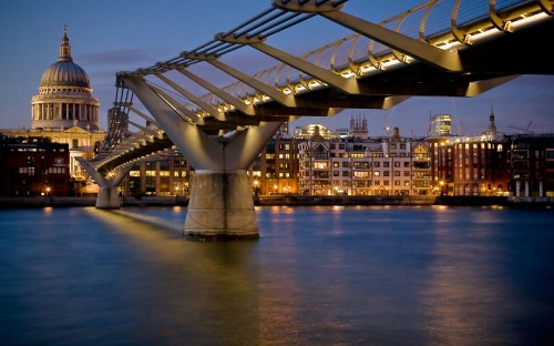 Image bridge over water during night time