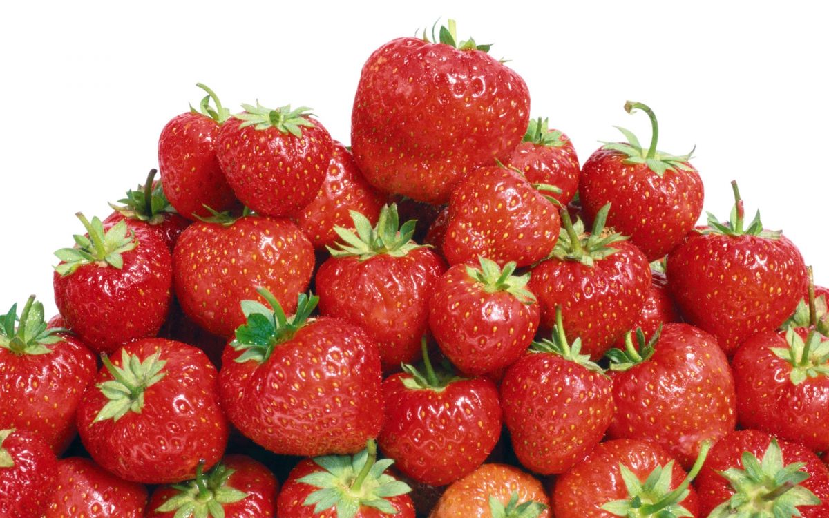 red strawberries on white background