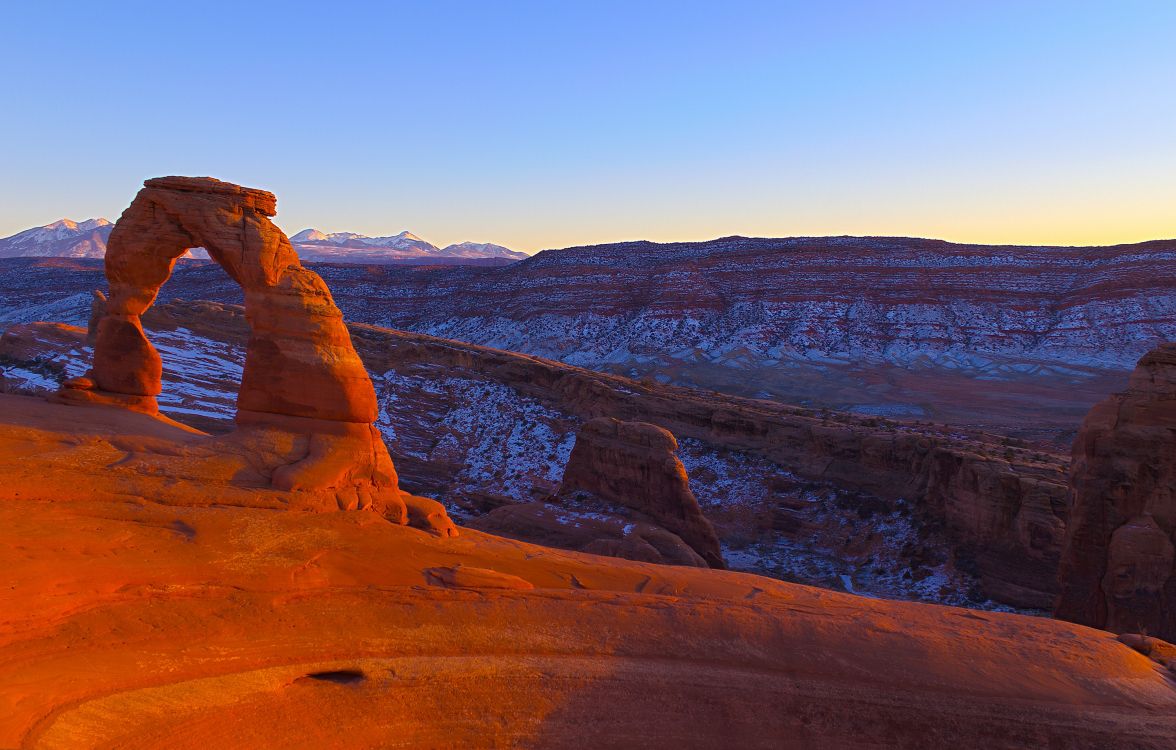 brown rocky mountain under blue sky during daytime