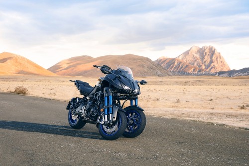 Image black motorcycle on road during daytime